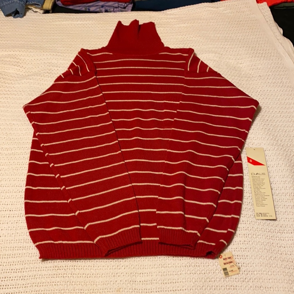 Claus sweater size small red with white stripes monogram on pocket.